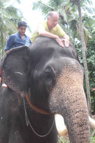 Dr. Whitfield rides an Elephant