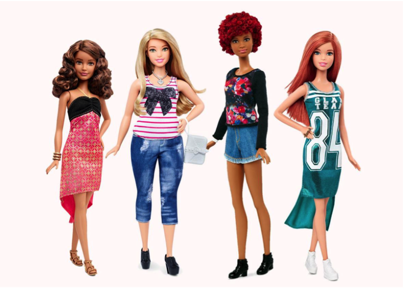Mattel’s new ‘petite,’ ‘curvy,’ and ‘tall,’ Barbie doll, next to an original Barbie doll.