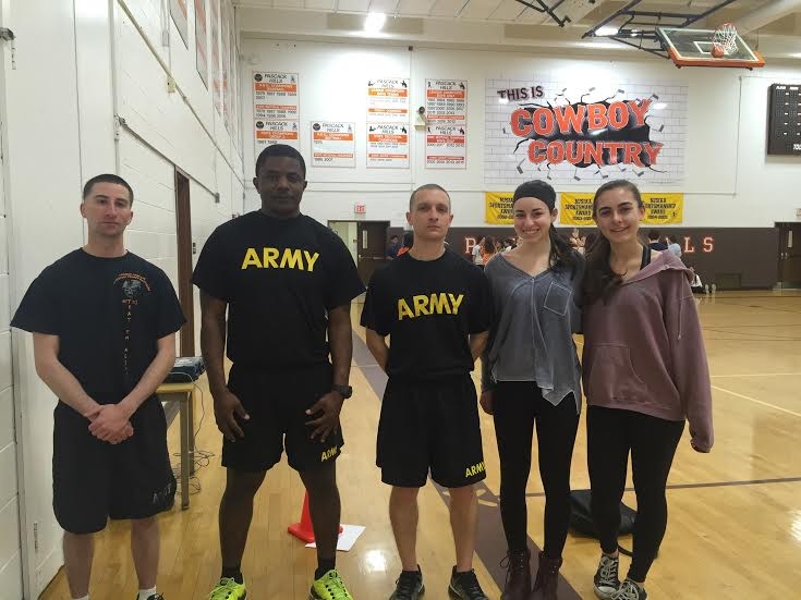 Seniors Jamie Spelling and Anya Balsamides with Army recruiters.
Photo from Jamie Spelling