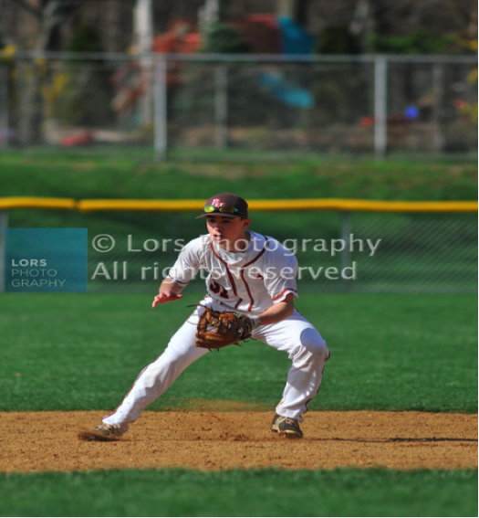 Freshman Julian Bulzomi fields a groundball for the 7-9 Cowboys. (Picture Credit: Lors Photography)