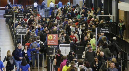 Passengers wait to go through security screening at a TSA checkpoint. Photo courtesy of NBC.