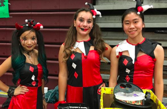 Jade Siegel (left), Olivia Izzo and Miranda Luo pose as Harlequinns for the Fieldstone Halloween carnival. (Photo by Jade Siegel)