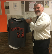 Paspalas with the new “going-away” baseball uniforms for Pascack Hills.  
Image Credit: Stephanie Kim