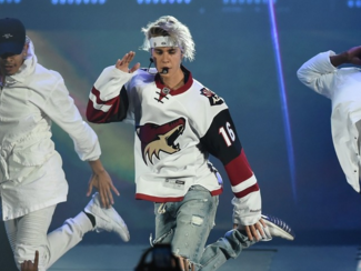 Photograph credits: http://www.abc15.com/sports/sports-blogs-local/heres-why-justin-bieber-wore-a-max-domi-arizona-coyotes-jersey-wednesday-in-glendale