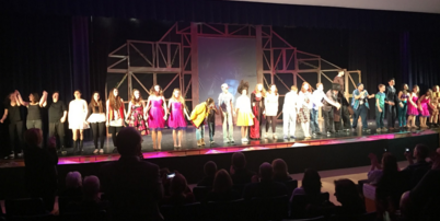 The cast and stage crew of Big Fish take a bow after their first performance. Image taken by Wikfors.