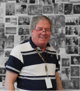 Señor Priddy with his wall of memories. Photo by Sam Zuckerberg