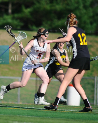 Ernest on the lacrosse field. Photo by Lors Photography. 