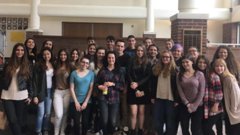 The Honors French IV class and the French exchange students pose together for a group photo at the end of French-American activity day. Photo by Jane Conboy.  
