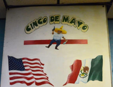 A mural displayed prominently above the grill. 