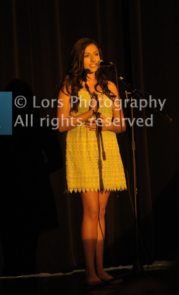 Gianna singing at the 2017 Talent Night. Photo by LORS Photography. 