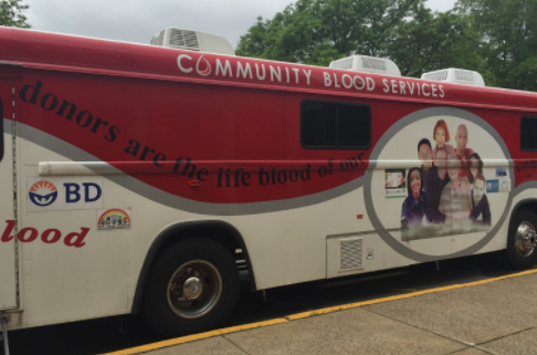 One of the blood donation trucks parked outside of the front entrance of Hills. Photo by Matthew Wikfors.