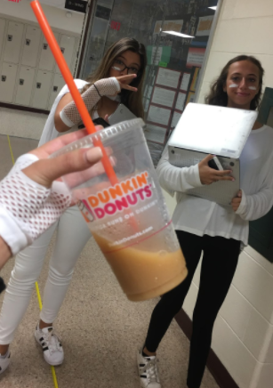 Juniors Sophie Mazzei and Skylar Backman pictured with a cup of coffee