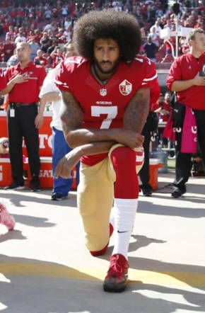  Colin Kaepernick, NFL Quarterback, kneeling during the National Anthem on a televised Sunday football game. 