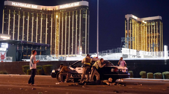 Police take position outside of the Mandalay Bay hotel on the night of October 1st. Photo courtesy of CNN.