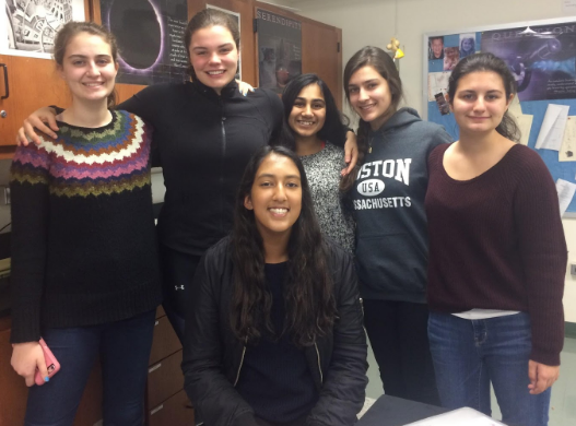 A few Together to Empower club members gathered at their meeting.
Left to right: Cate Heverin, Kimmy Shannon, Vedika Jha, Zainah Alizade, Lily Ashyanti 
Bottom Center: President Izza Khan 