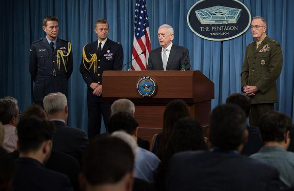 Defense Secretary Mattis and Chairman of the Joint Chiefs of Staff General Dunford brief reporters alongside French and British attachés during a joint press conference at the Pentagon (Photo courtesy of DOD). 