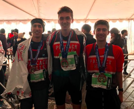 Left to right: Raffi Najarian, Dillon Jensen, and Nick Michelis after finishing the marathon in their Hills uniforms