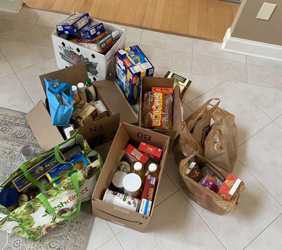 Donations collected at a contactless food drive drop-off site hosted by National Honors Society member Alec Boyajian. The organization is seeking to safely help local food pantries and those who are in need.