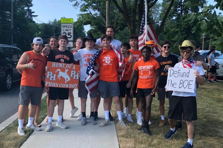 Pascack Hills students attend a protest in the school’s parking lot to speak out against changing the Cowboy mascot. 