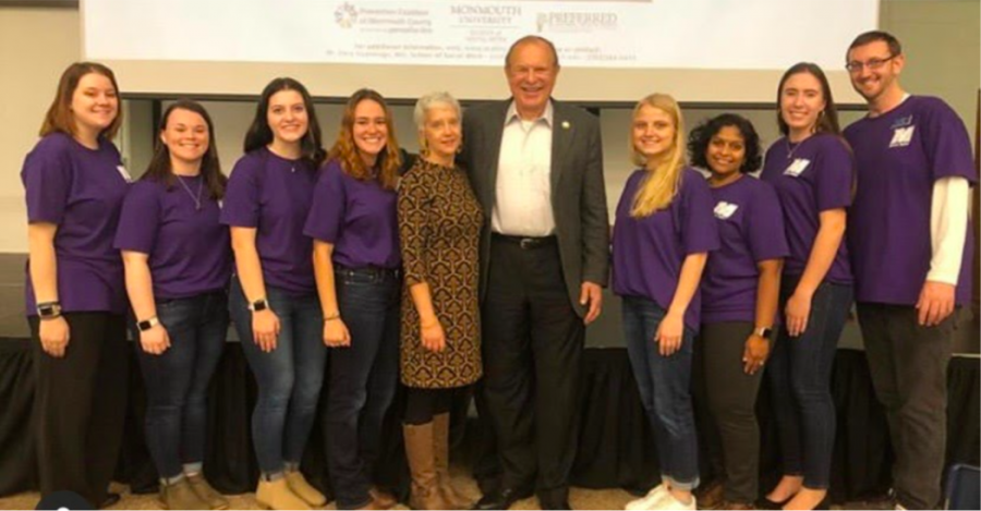 Macaluso, fourth from the left, pictured with her peers and former senator Lesniak at last year’s opioid crisis teach-in. 