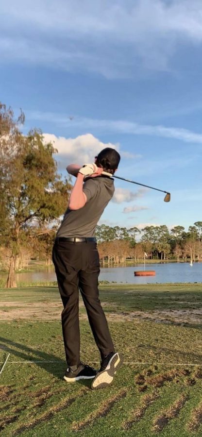 Hills junior Dylan Reissman golfing. He has traveled to Florida in order to improve his game this school year.