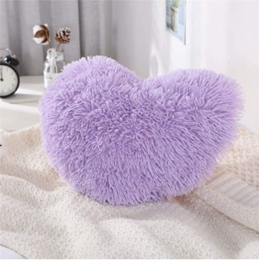Heart plush pillow: Not only is this pillow a perfect gift but it’s also perfect for room decor. It shows that you care while also giving her something that she will use in the future. Link to buy