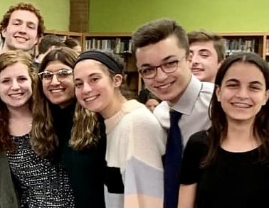 Members of this years debate team pictured at a tournament in December 2019.
