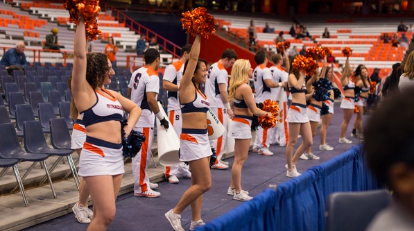 Syracuse cheerleaders at a womens basketball game. 