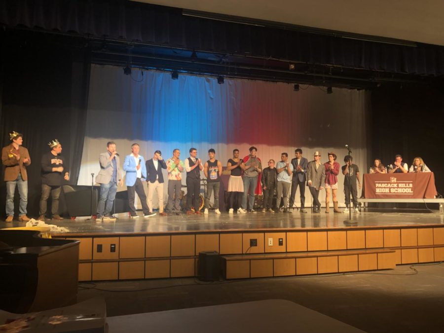 The hosts, contestants, judges, and prior winners of Mr. Pascack Hills on stage. 