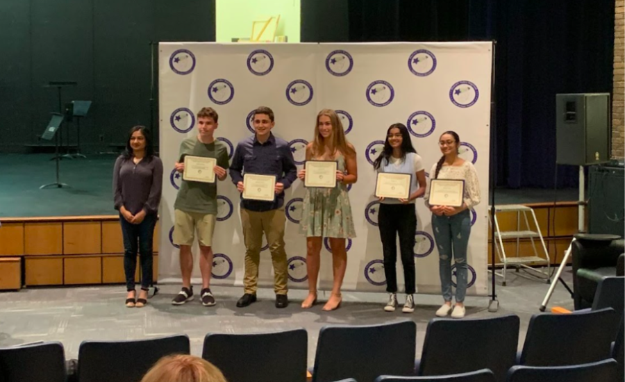 BOE vice president Gini Varghese (left) with some students from Hills and Valley. Junior Trayee Jha (second from right) was recognized for receiving an award in social studies. 