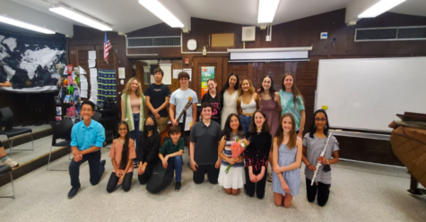 A group photo of Hills musicians with the middle schoolers. 