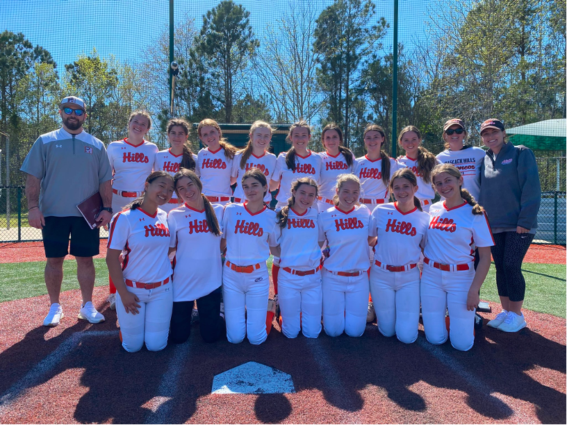 The 2022 Pascack Hills Myrtle Beach Team with coaches Michael Curatola (left), Tara Delmour (right side, on the left), and Erin Curatola (farthest right).