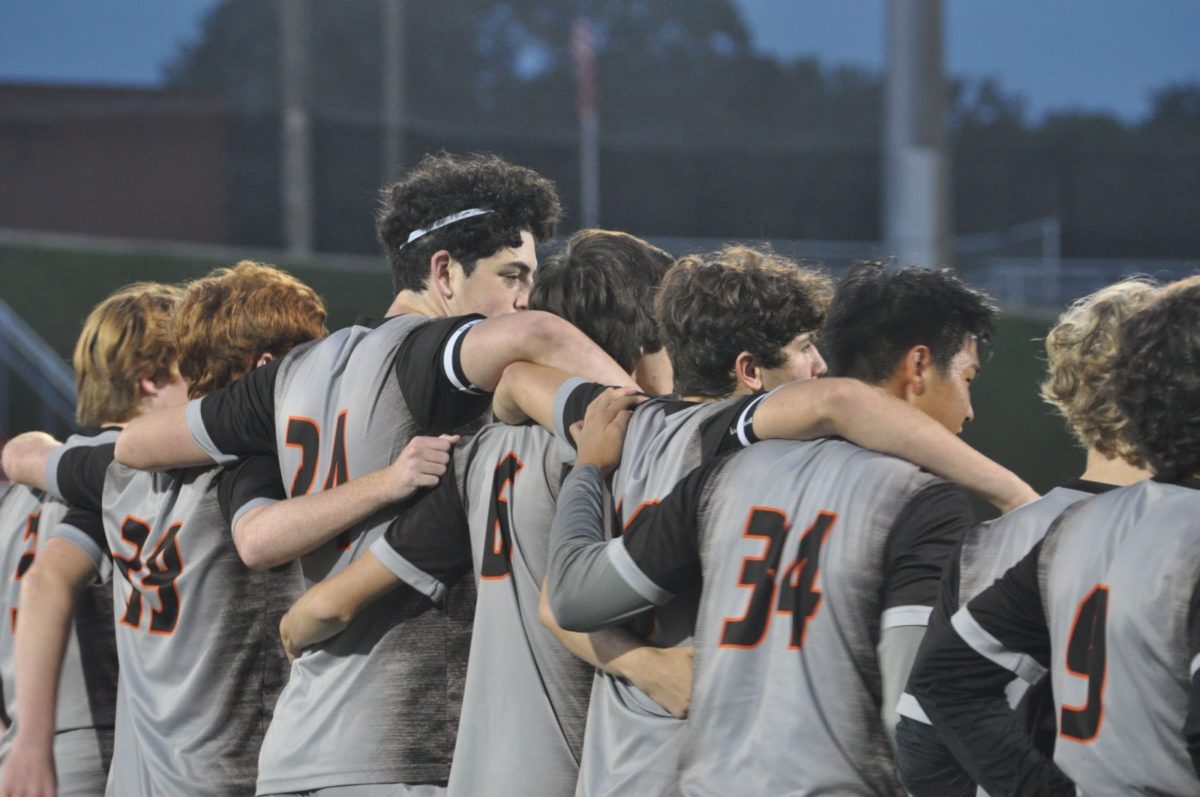 The boys varsity soccer team during their game Monday night.