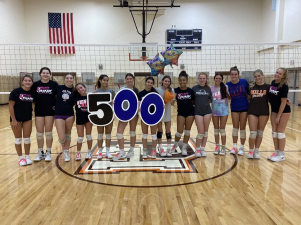 Senior volleyball player Ella Espino celebrates her accomplishment of 500 digs.