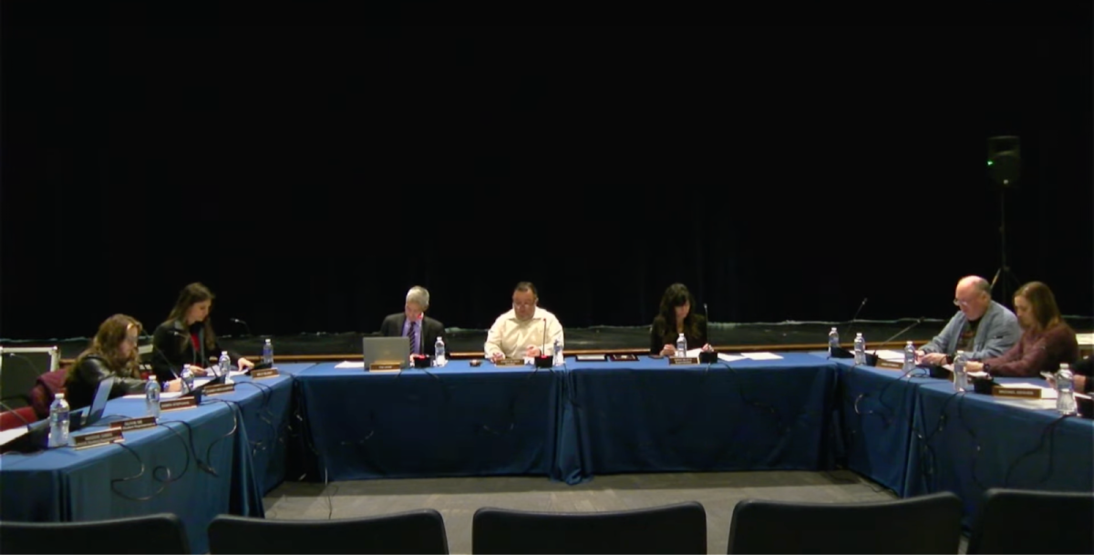 The BOE at the start of the meeting in the Pascack Hills auditorium.
