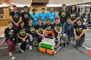 The Pascack Pi-oneers posing with members of the FRC Team Sigma 9629.
