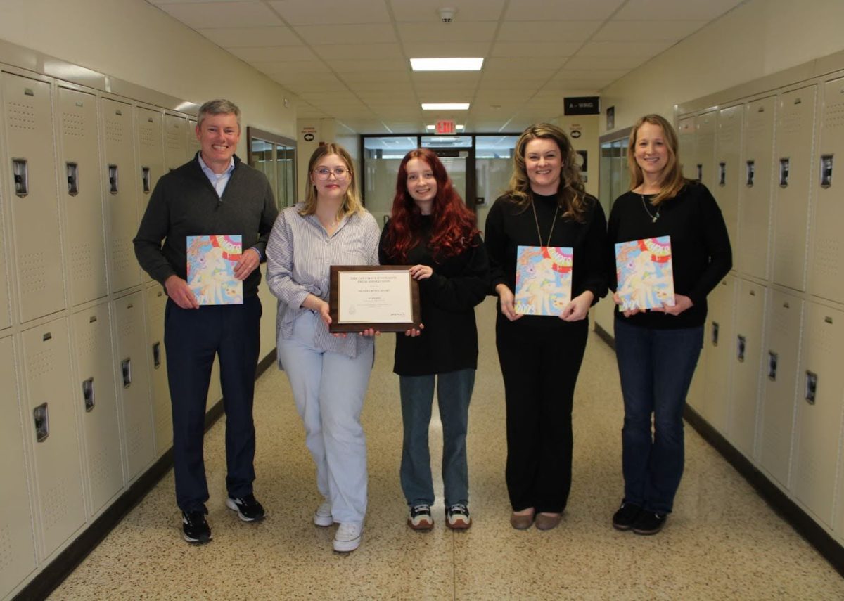 From left to right: Pascack Hills Principal Timothy Wieland, Editor-in-Chief Kaitlyn Verde, Layout Editor Anna Stieglitz, Advisor Katherine Donahue, and Advisor Danielle Garretson. 