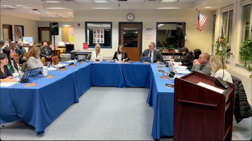 The BOE at the start of the meeting at Pascack Hills High School.