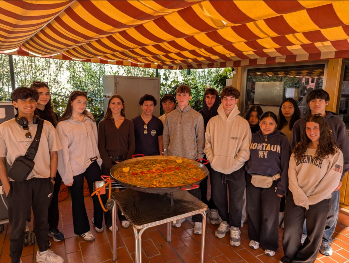 Chefs in the making learning how to cook Paella!
