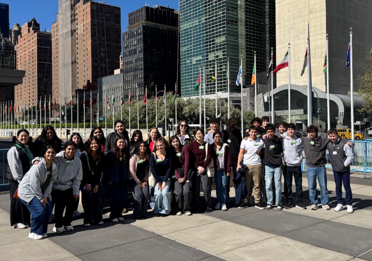 The Model UN team posing for a picture outside of the UN

